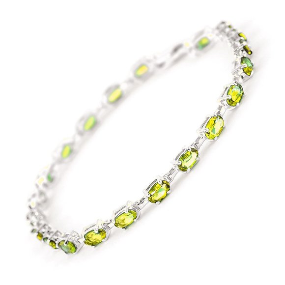 14K. SOLID GOLD TENNIS BRACELET WITH PERIDOTS - Picture 2 of 5